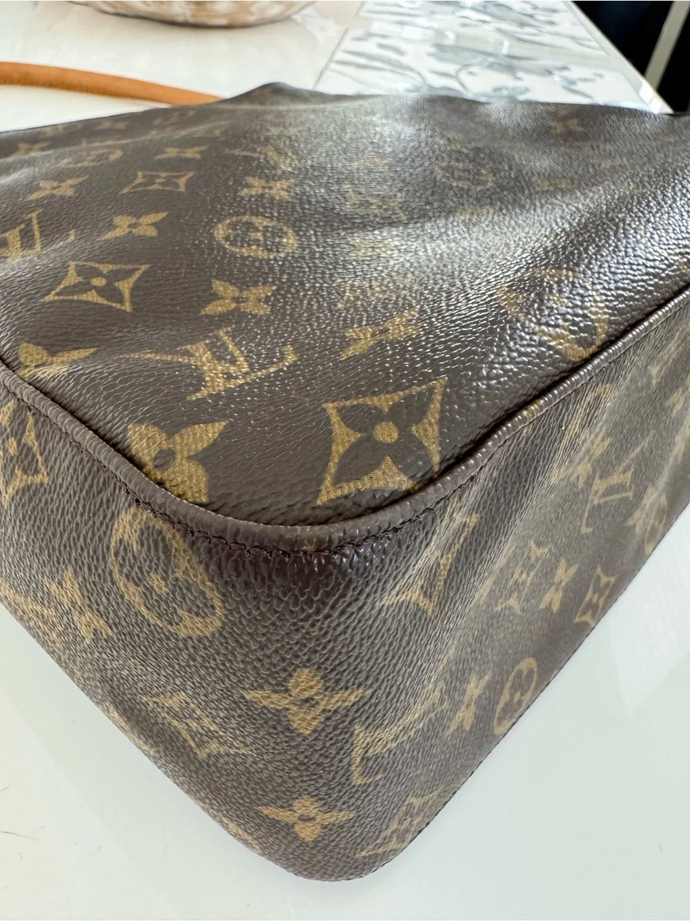 Louis Vuitton curved cowhide pocket